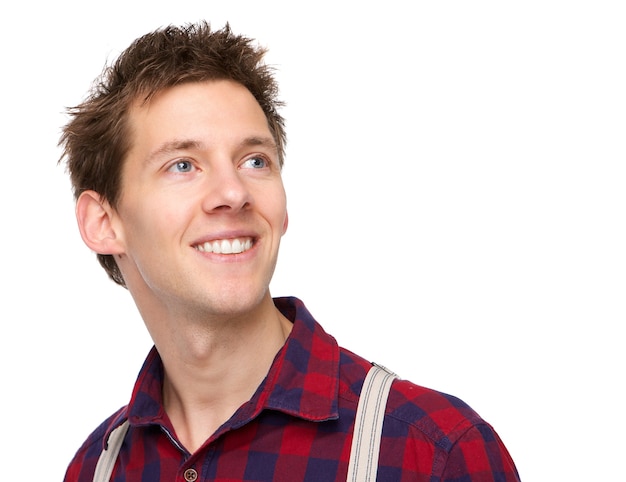 Young man smiling and looking up