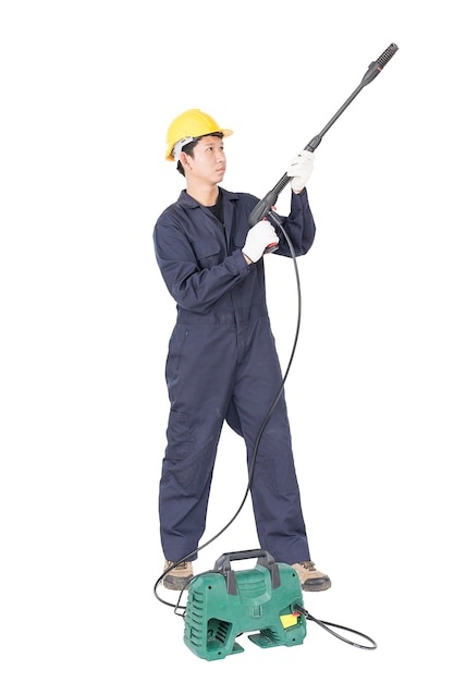 Young man stand and holding high pressure water gun