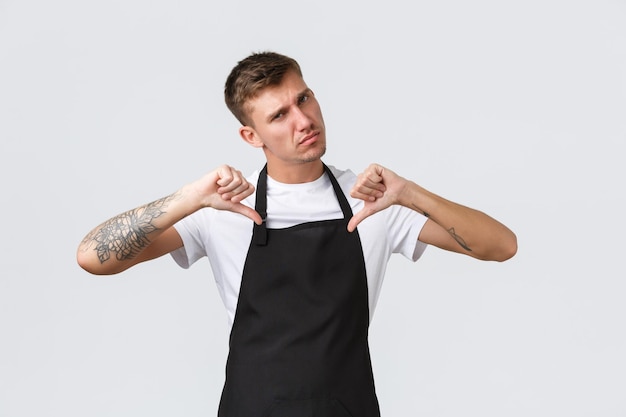 Photo young man standing against white background