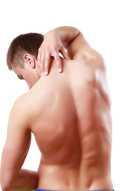 Young man standing back with pain in neck