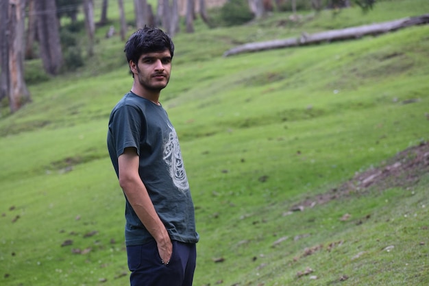 Young man standing on field