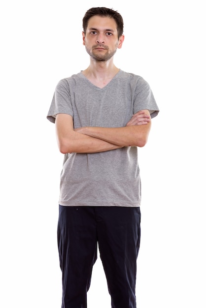 young man standing with arms crossed