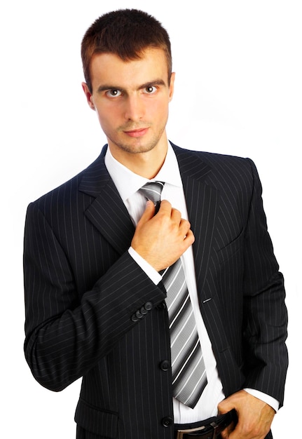 Photo young man in a suit on a white background...