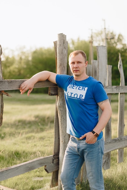 A young man in the summer outdoors