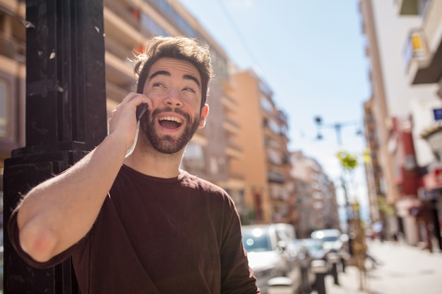 Young man talking on mobile phone