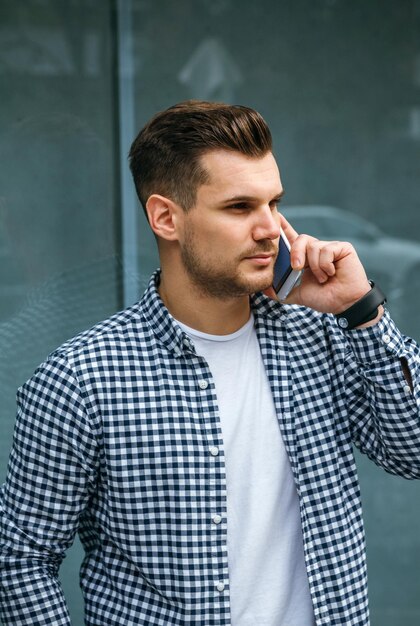 Young man talking on the mobile