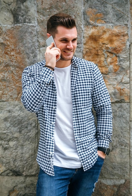 Young man talking on the mobile