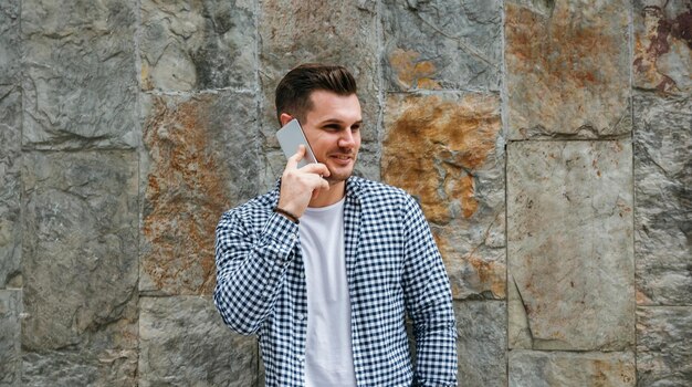 Young man talking on the mobile