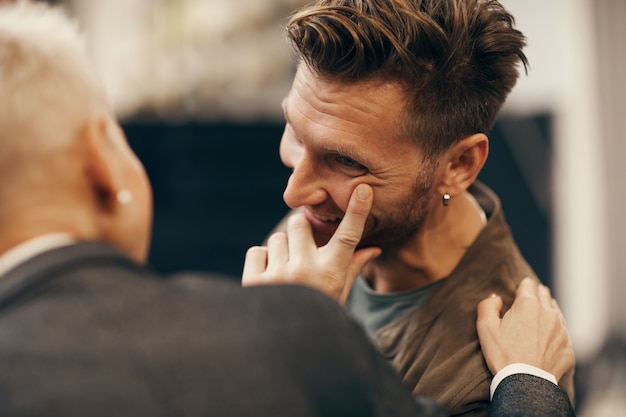 Young man talking to woman