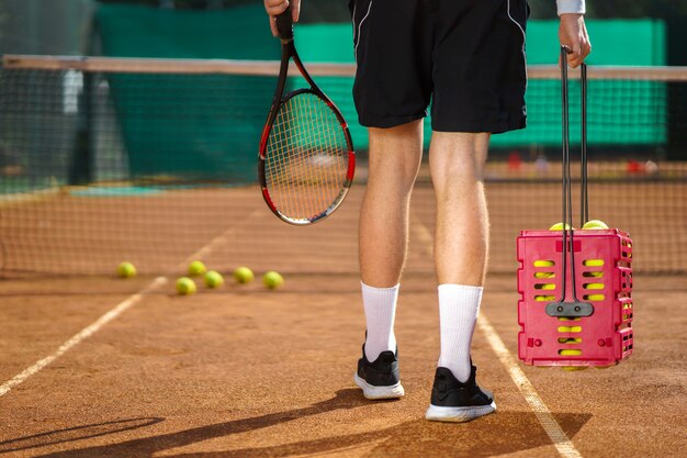 Young man on the tennis court