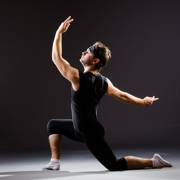 Young man training for ballet dances