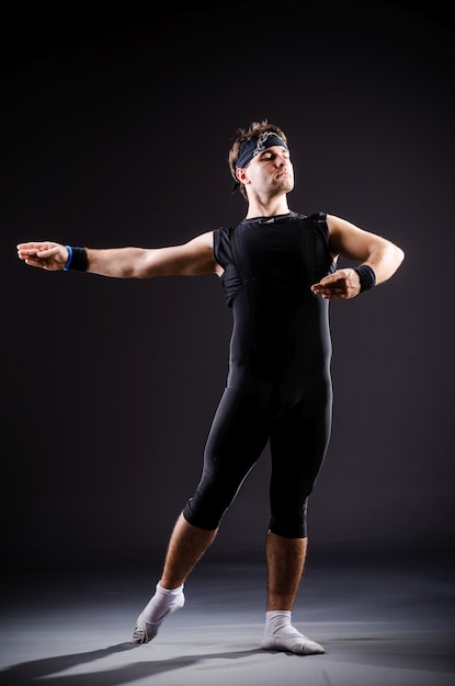 Young man training for ballet dances