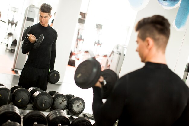 Young man training in the gym