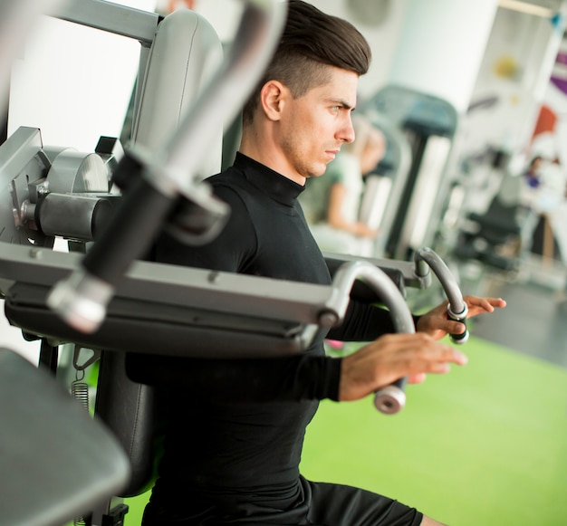 Young man training in the gym