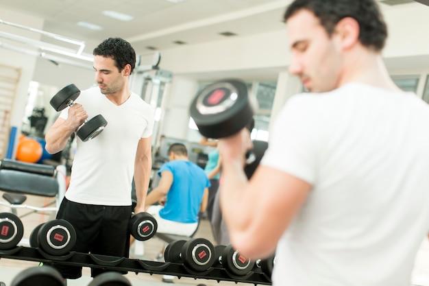 Young man training in the gym