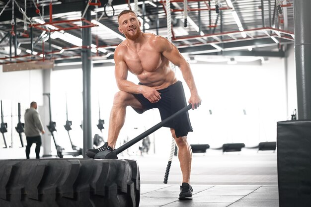 Young man training at gym