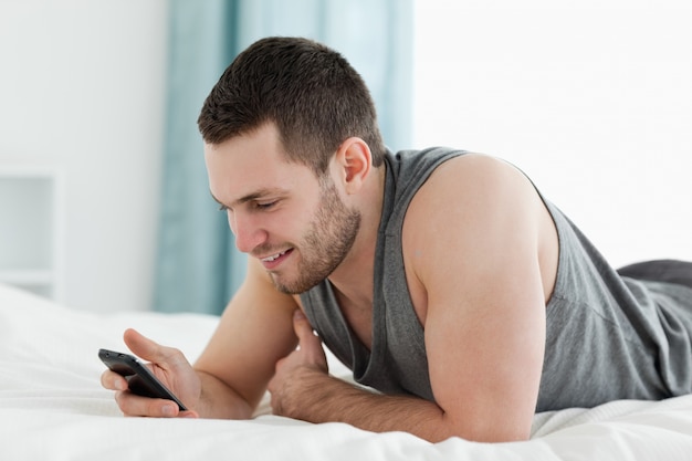 Young man using his mobile phone