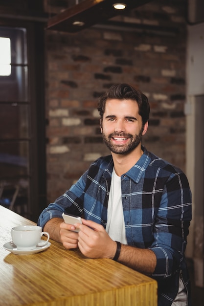  Young man using his phone