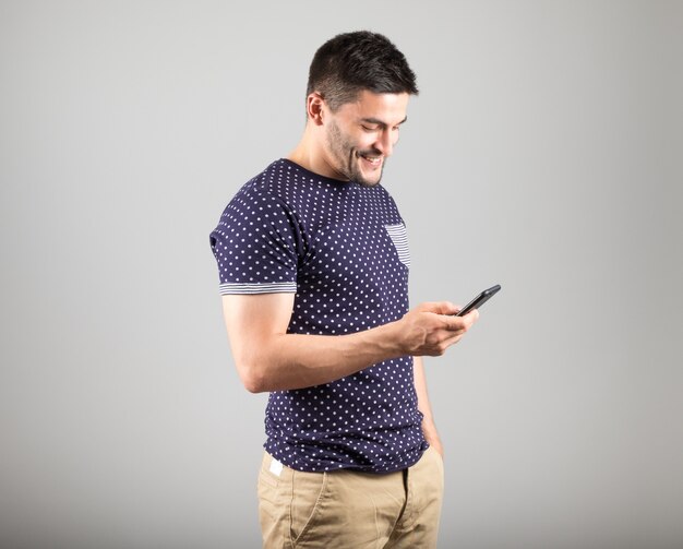 Young man using his smartphone