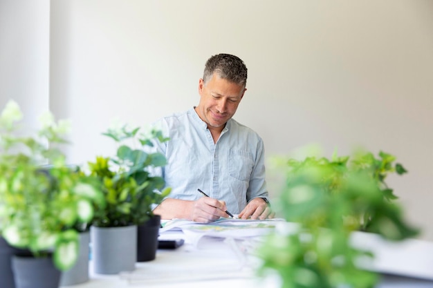 young man using laptop at home