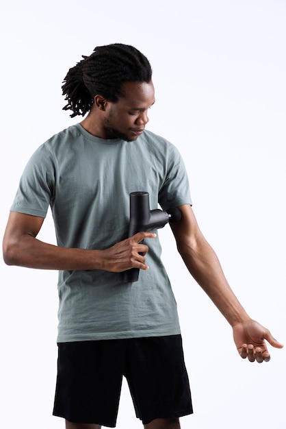 Photo young man using message gun