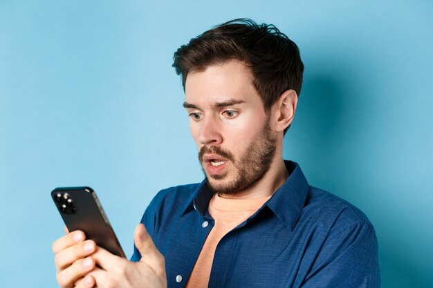 Young man using mobile phone