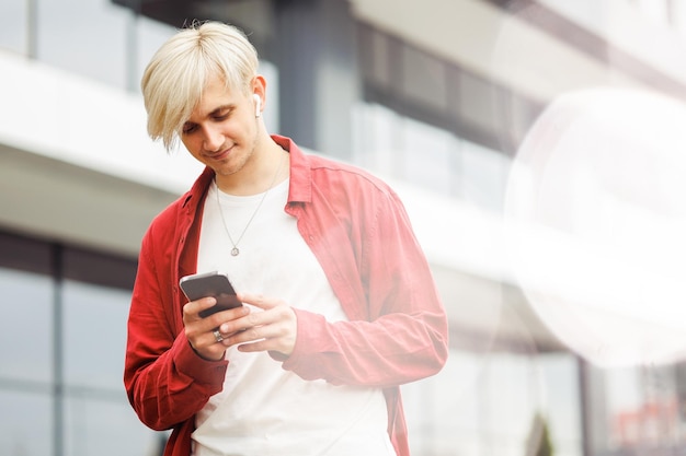 Young man using technology and digital services