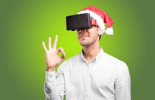 Young man using a virtual glasses