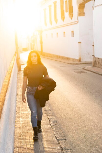 Young man visiting the streets of Sanlucar de Barrameda