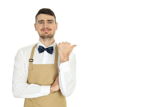 Young man waiter isolated on white background