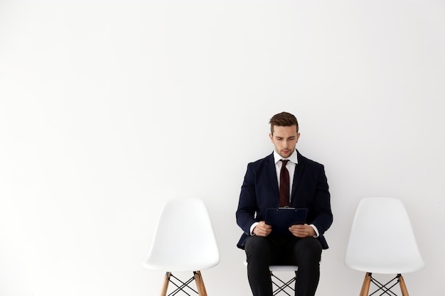 Young man waiting for job interview