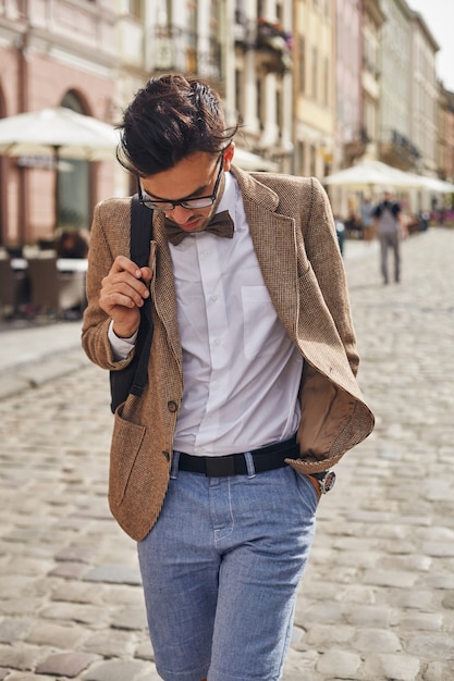 Young man walking on town