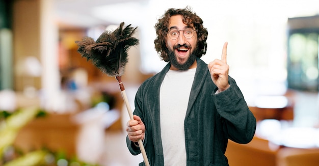 Young man wearing bathrobe night suit with a duster