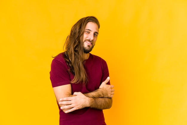 Young man wearing a long hair look