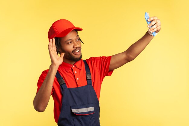 Young man wearing mask against white background