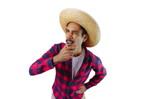 Young man wearing traditional clothes for Brazilian June festival