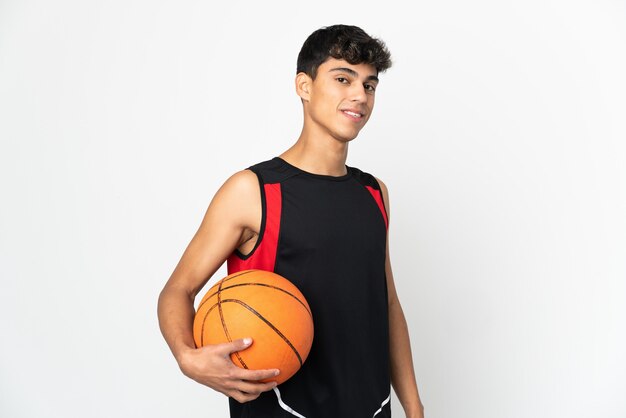 Young man over white playing basketball