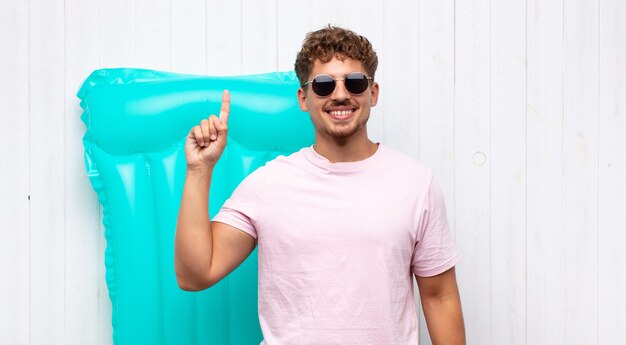 young man with an air mattress