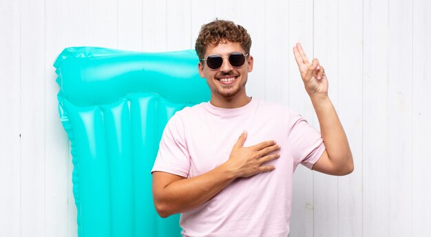 young man with an air mattress