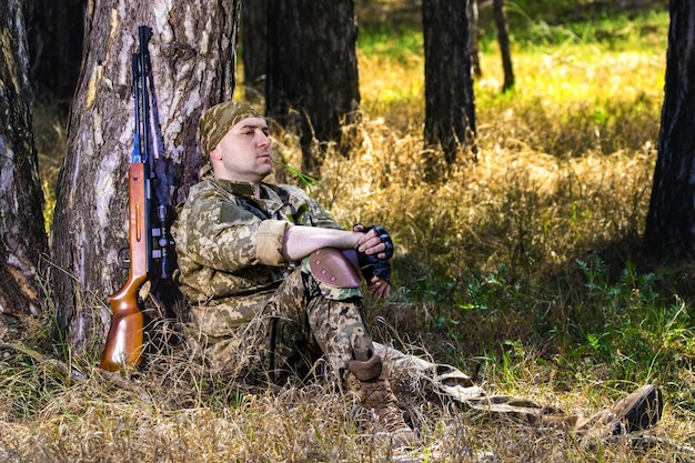 Young man with an air rifle