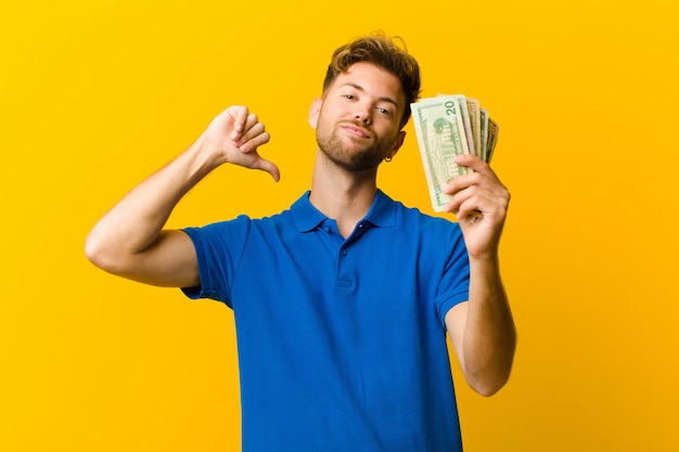 Young man with banknotes