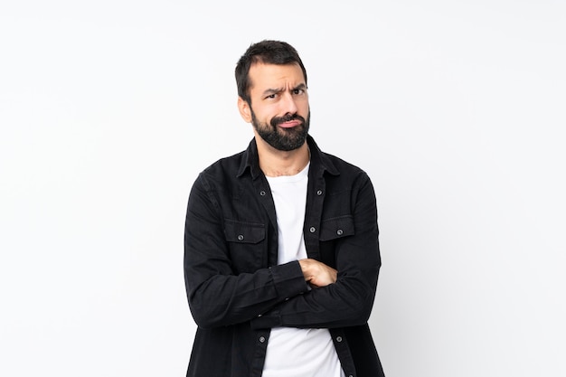 Young man with beard feeling upset