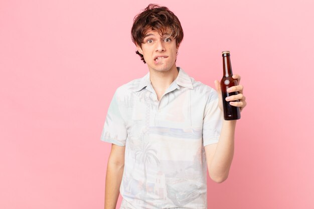 young man with a beer