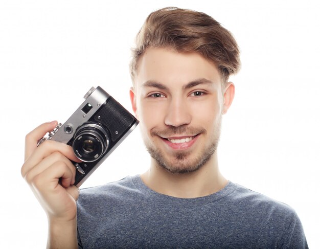 Young man with camera