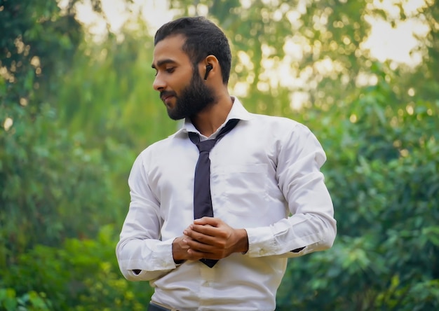 A young man with earbuds image