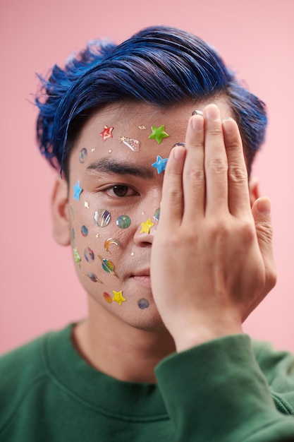 Young Man with face Stickers