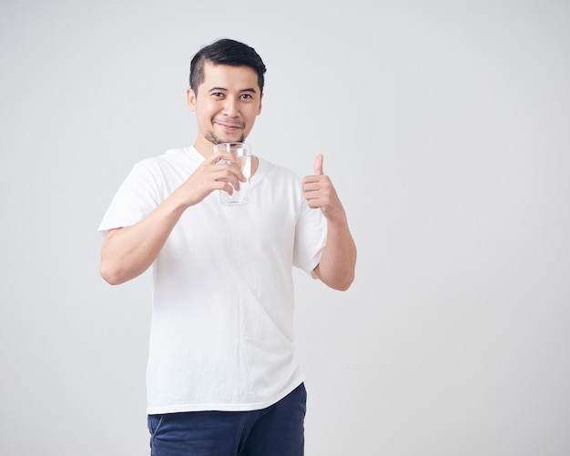 Young man with glass of water.