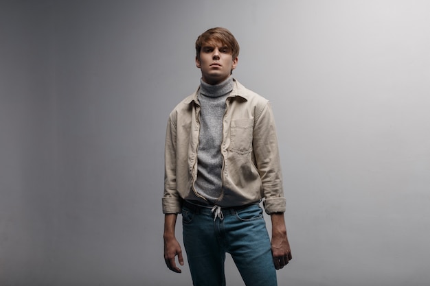 Premium Photo  Young man with a haircut in a bright stylish