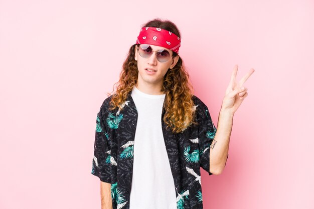 Young man with long hair and glasses