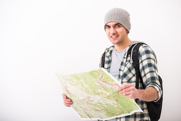 Young man with map and copyspace